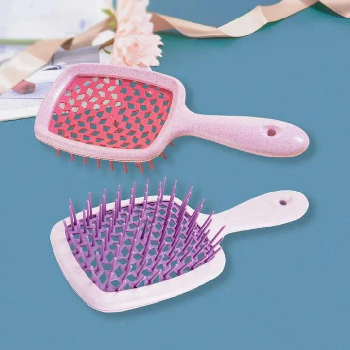 DetanglePro Air Cushion Hair Comb in vibrant colours, designed to effortlessly detangle and smooth all hair types