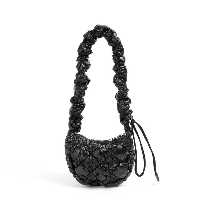 Stylish plaid quilted sling bag with adjustable strap for versatile shoulder or crossbody wear