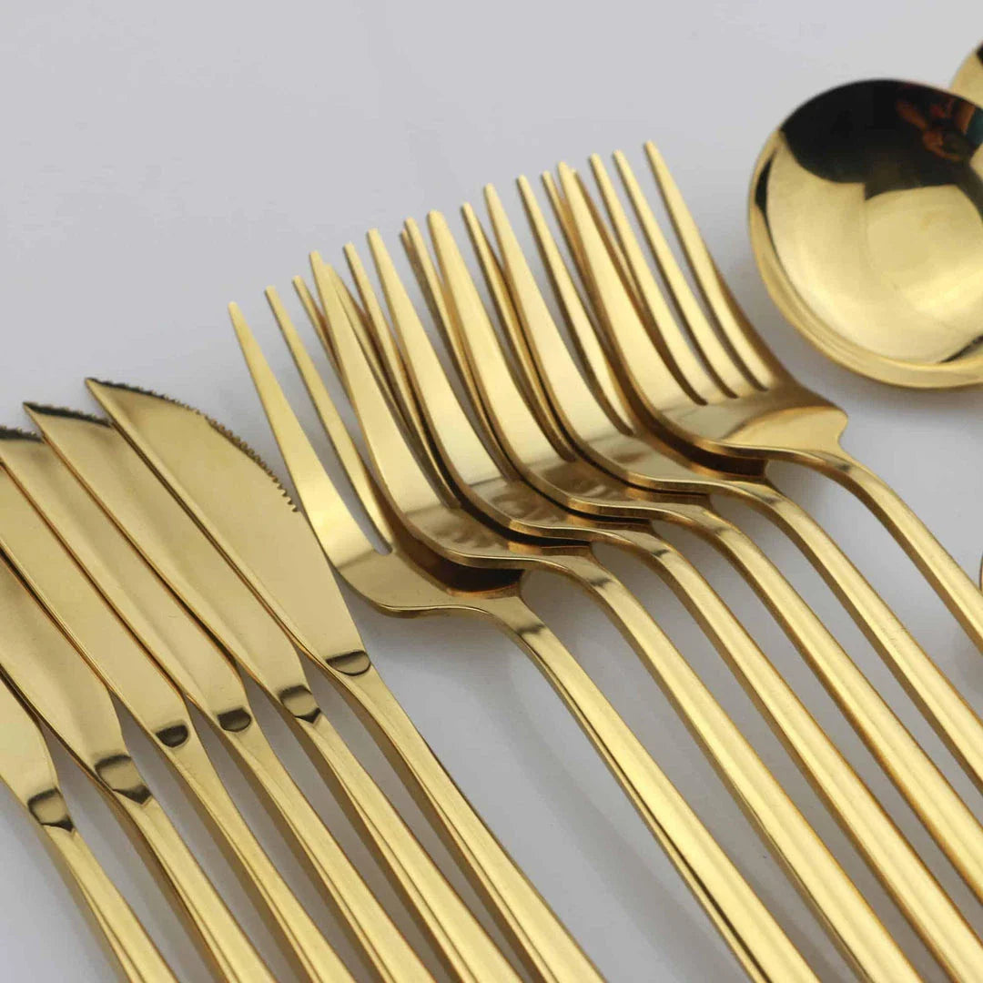 Premium 24-piece stainless steel tableware set with elegant black handles, ideal for formal and casual dining in the United Kingdom