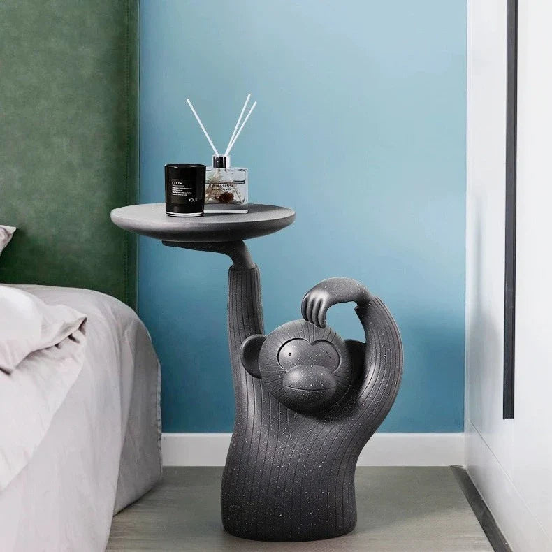 Decorative monkey-inspired resin coffee table tray in light grey or dark grey colour, suitable for serving, display, or as a living room accent piece.