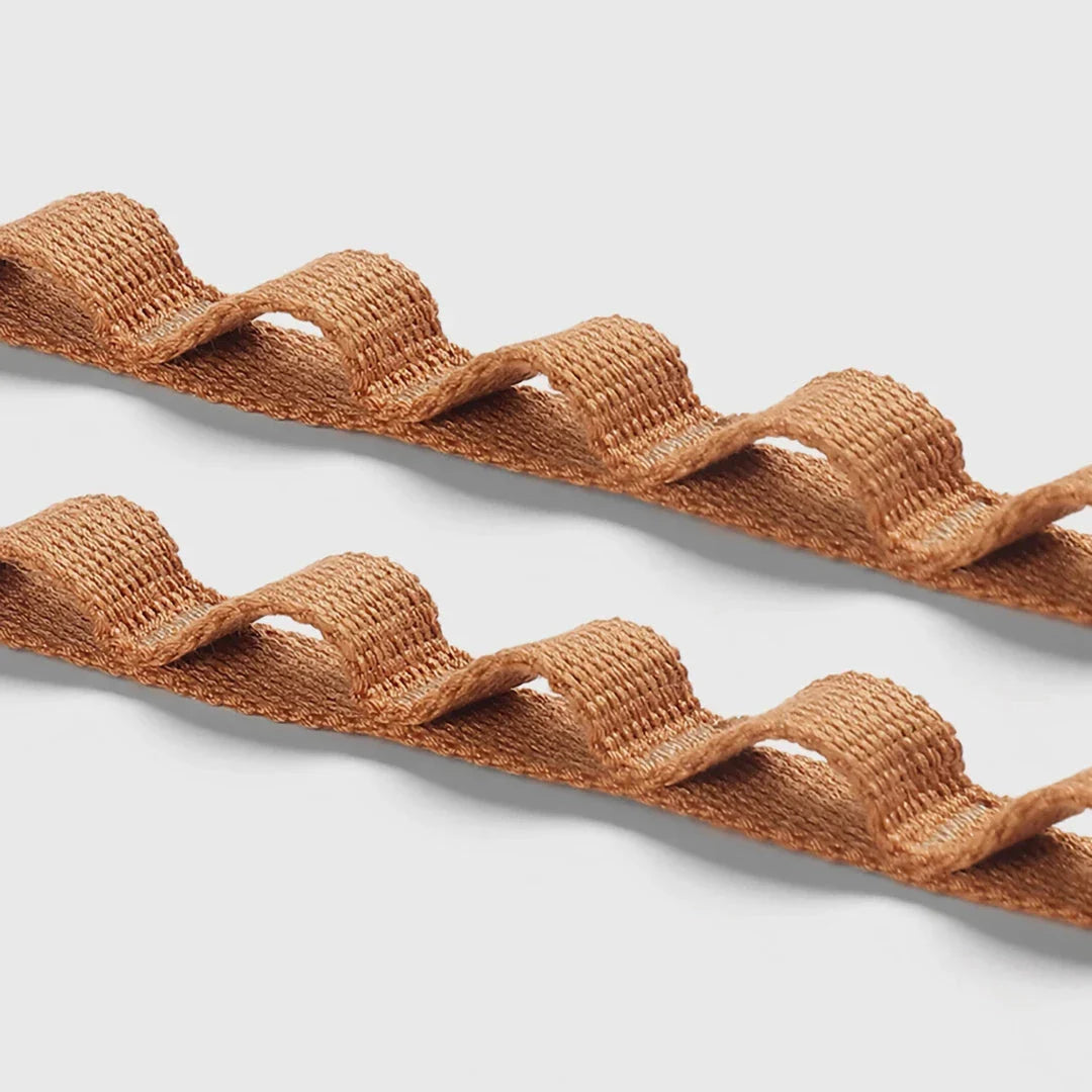 Adjustable camping strap with multi-ring design for organising outdoor gear and supplies