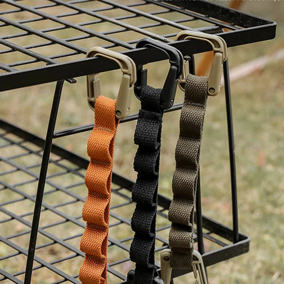 Adjustable camping strap with multi-ring design for organising outdoor gear and supplies