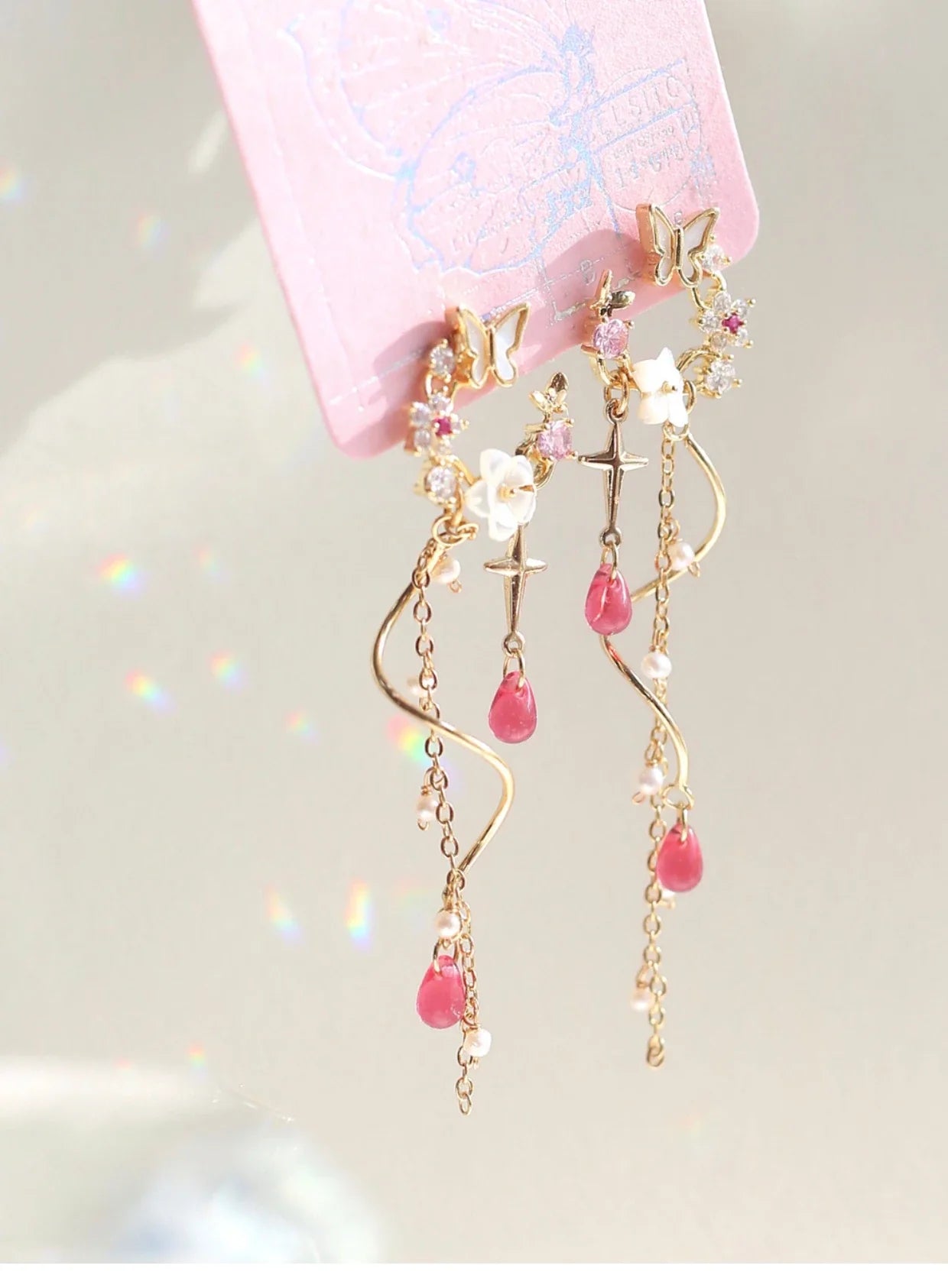 Elegant and Exquisite Gilded Earrings with Zircon Stones, Freshwater Pearls, and Resin Raindrops