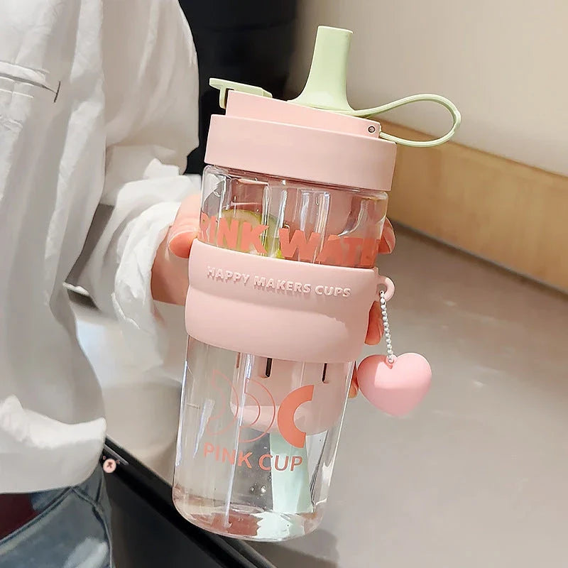 27oz water bottle with straw filter cover in pink, green, and blue colours for stylish hydration on the go