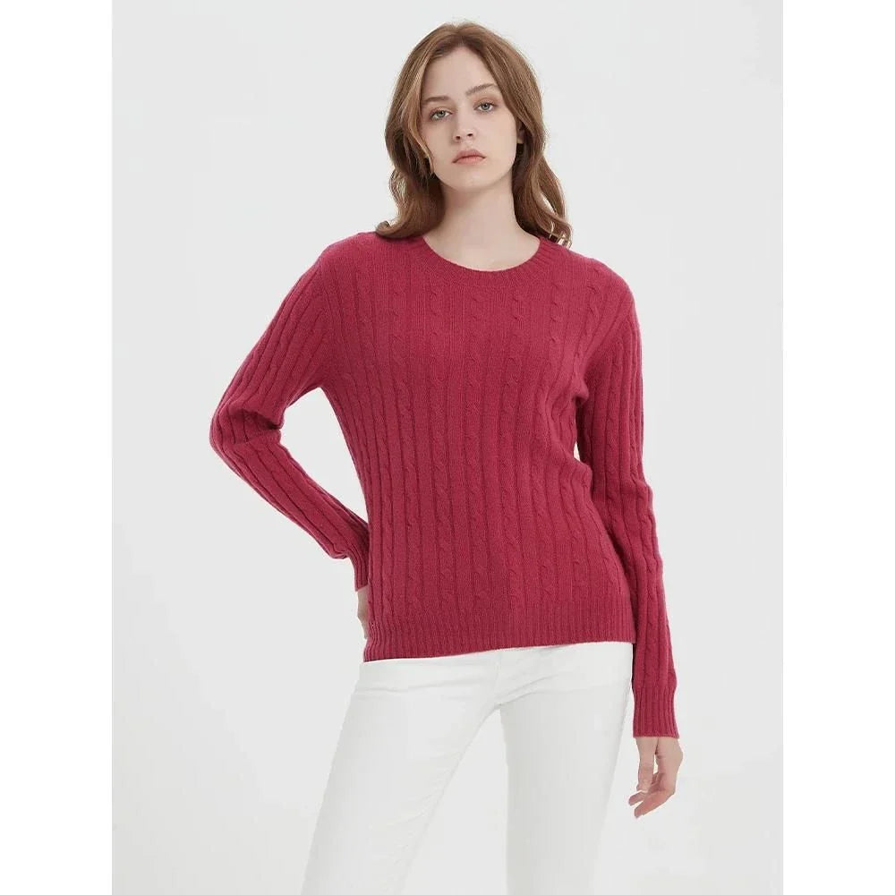 A luxurious 100% British wool cable knit jumper in a rich camel colour, perfect for keeping warm during the UK's chilly winters.