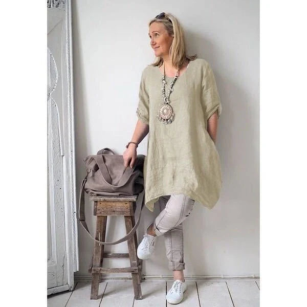 Irregular hem dress in a stylish beige colour, featuring a unique asymmetrical hemline and a comfortable cotton blend fabric