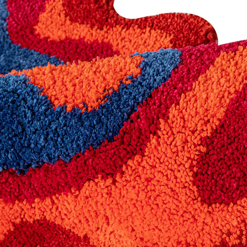Vibrant 70s retro psychedelic tufted area rug with abstract design, perfect for adding vintage charm and modern style to your home