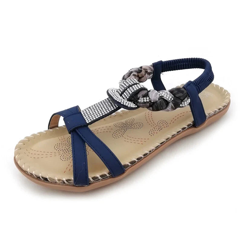 Stylish low-top toe sandals with two-layer leather upper, raw rubber sole, and rhinestone embellishments for chic British fashion
