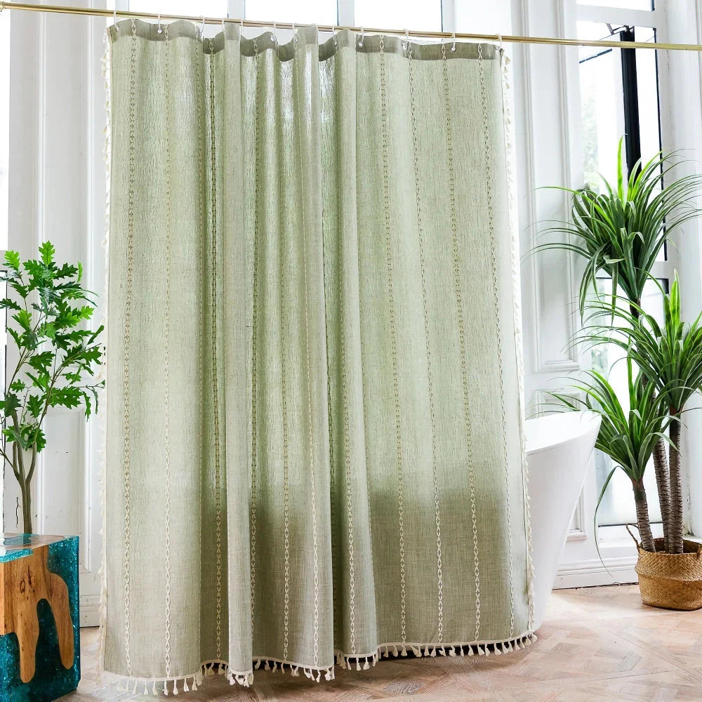 Premium bohemian tassel shower curtain with unique stitching design, waterproof coating, and durable linen blend material for a relaxing bathroom oasis