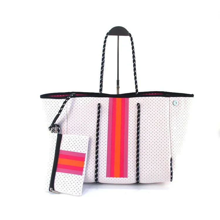 A neoprene beach bag in a stylish design, perfect for British summer adventures at the coast