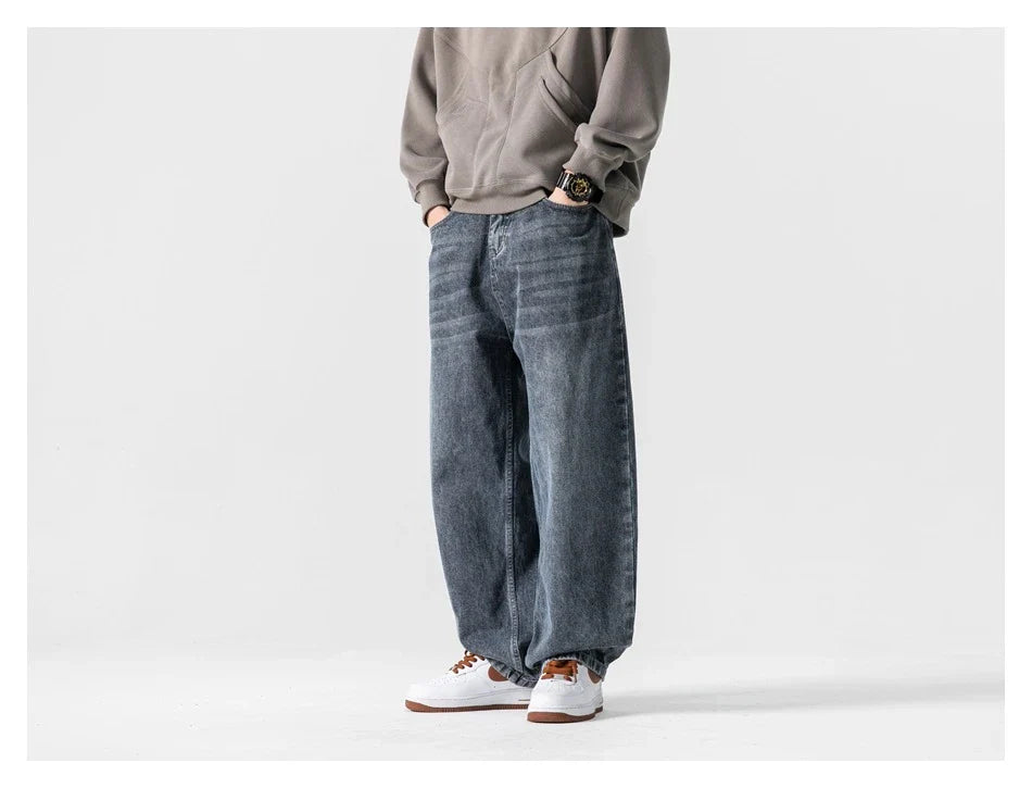 A pair of stylish retro-inspired Japanese jeans in black and grey, featuring a mid-rise waist and straight leg silhouette for a flattering, comfortable fit.
