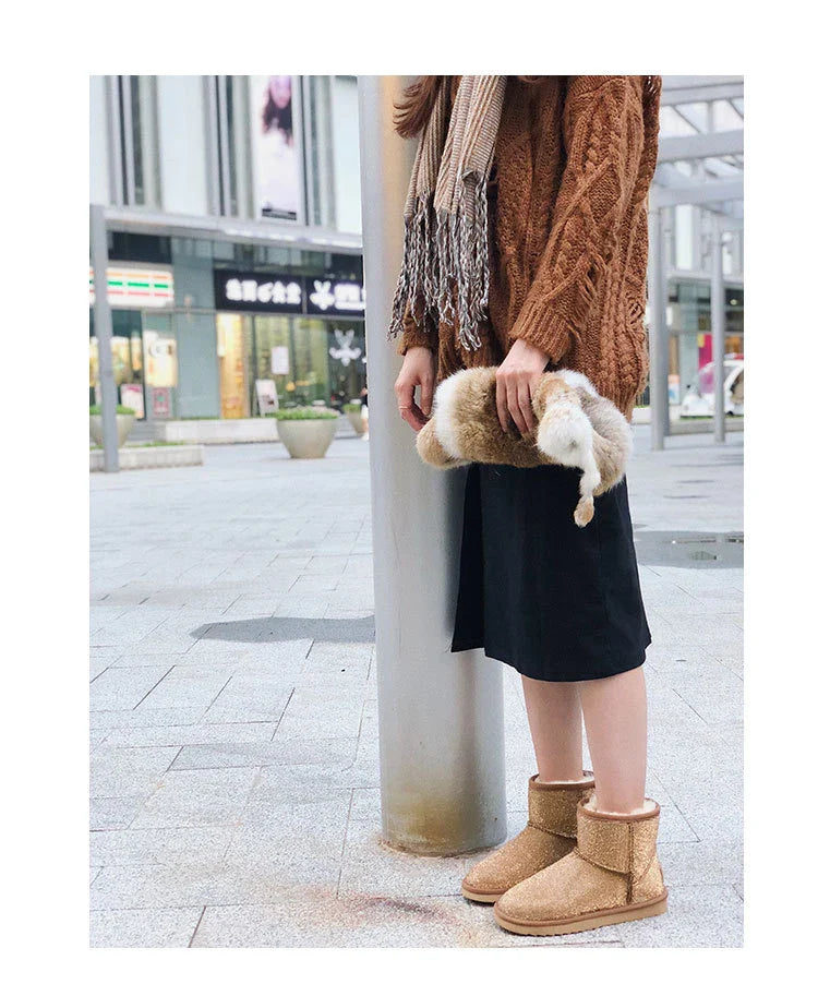 Premium rhinestone-embellished ankle boots for women, featuring a shimmering upper and durable rubber sole for winter wear