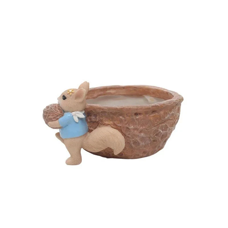 Cartoon squirrel-themed succulent planter in resin material, featuring a drainage hole for healthy plant growth