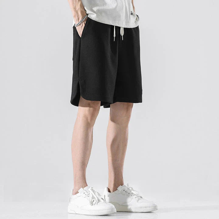 Premium British-made knitted sports shorts in a variety of classic colours, featuring an elastic waistband and loose, comfortable fit.