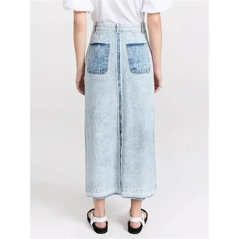 A stylish denim skirt with a split colour patchwork design, crafted from high-quality cotton for comfort and durability.