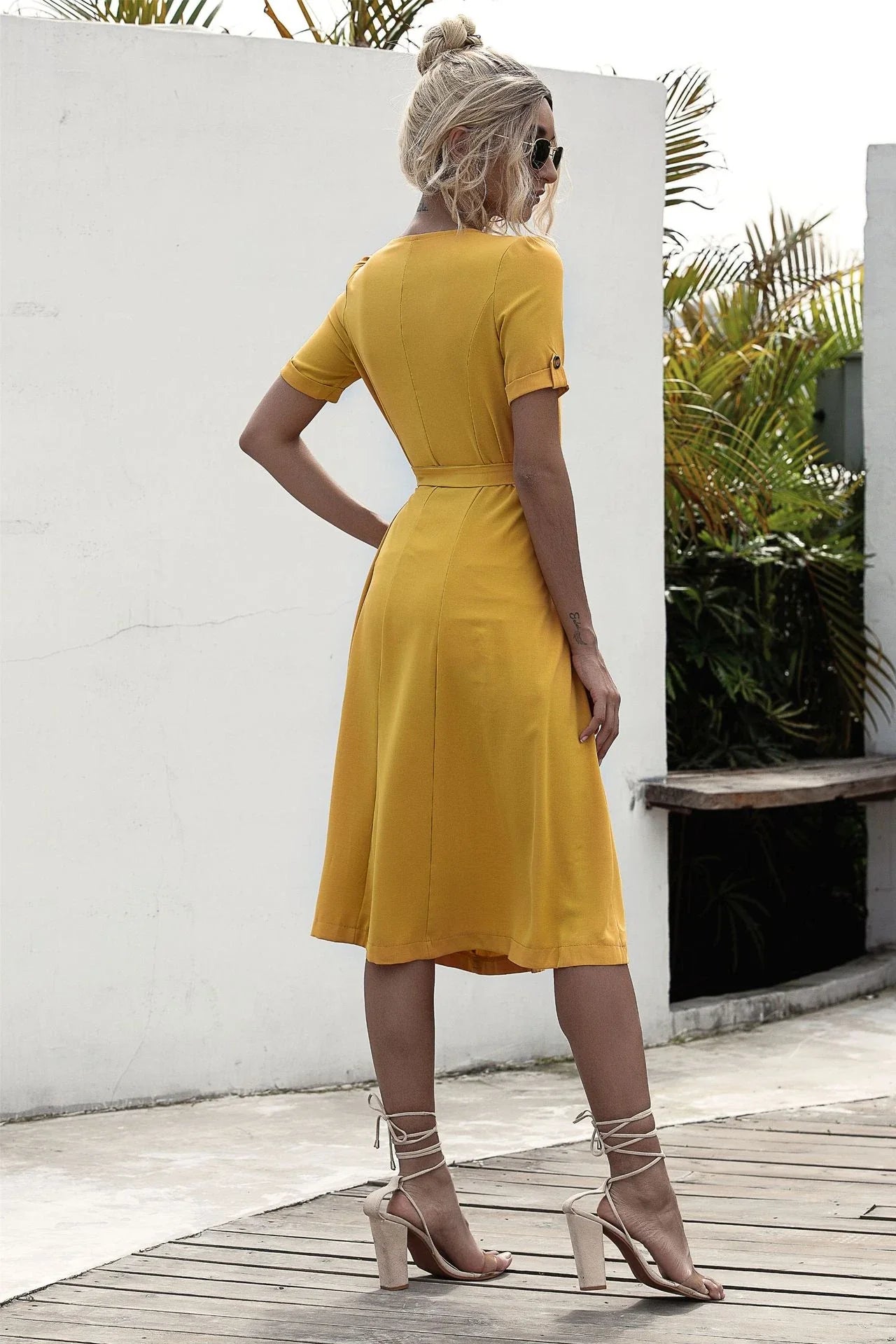 Stylish lace-up button dress in a soft, breathable cotton-blend fabric with a flattering middle waist silhouette