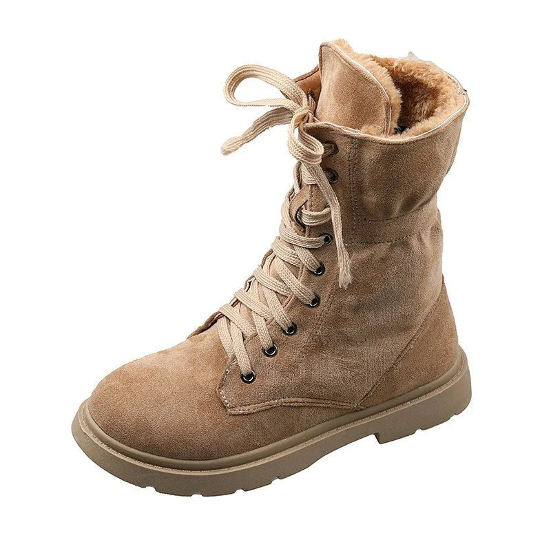 A pair of stylish British retro boots with a durable rubber sole and a cloth upper, perfect for fashionable female students.