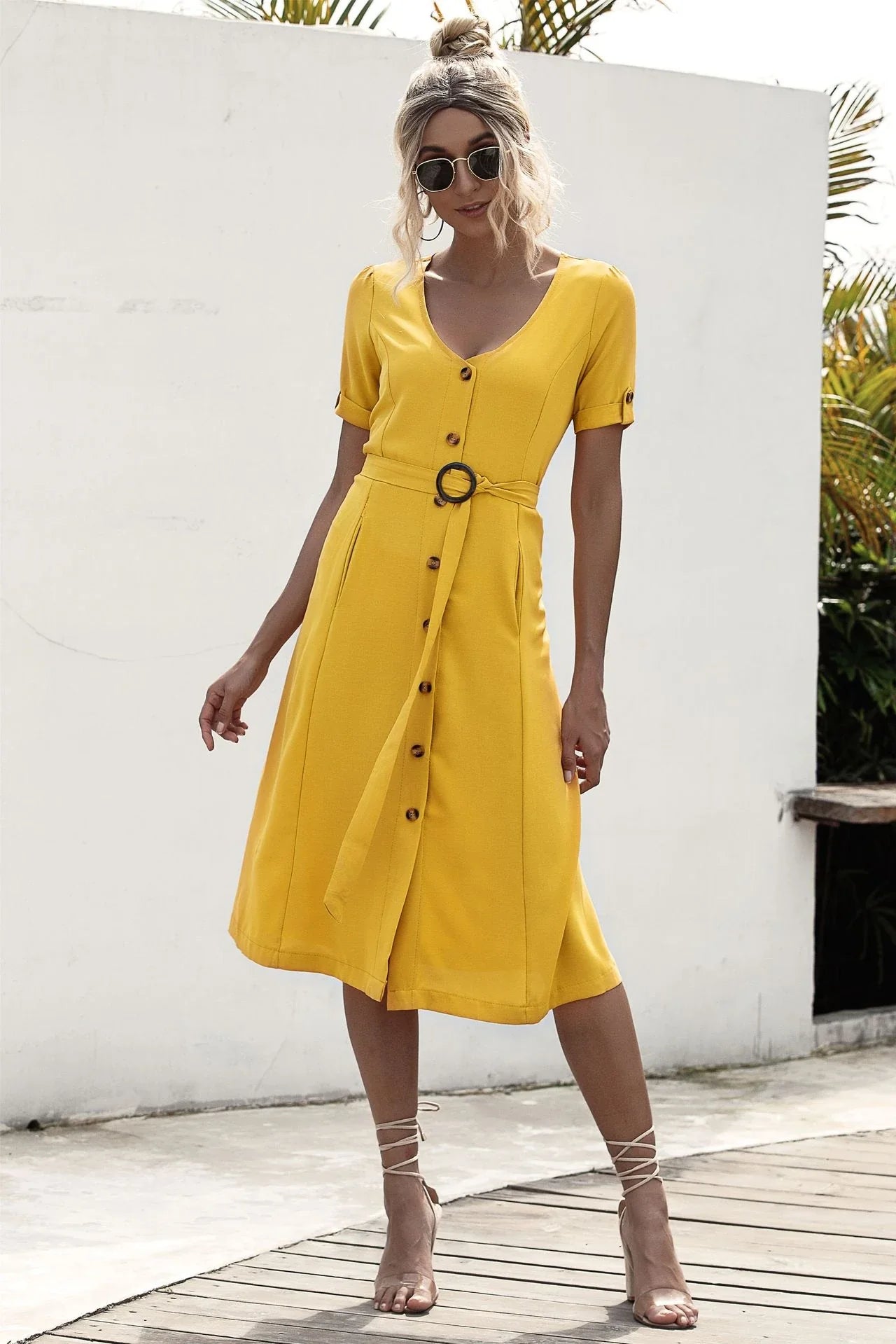 Stylish lace-up button dress in a soft, breathable cotton-blend fabric with a flattering middle waist silhouette