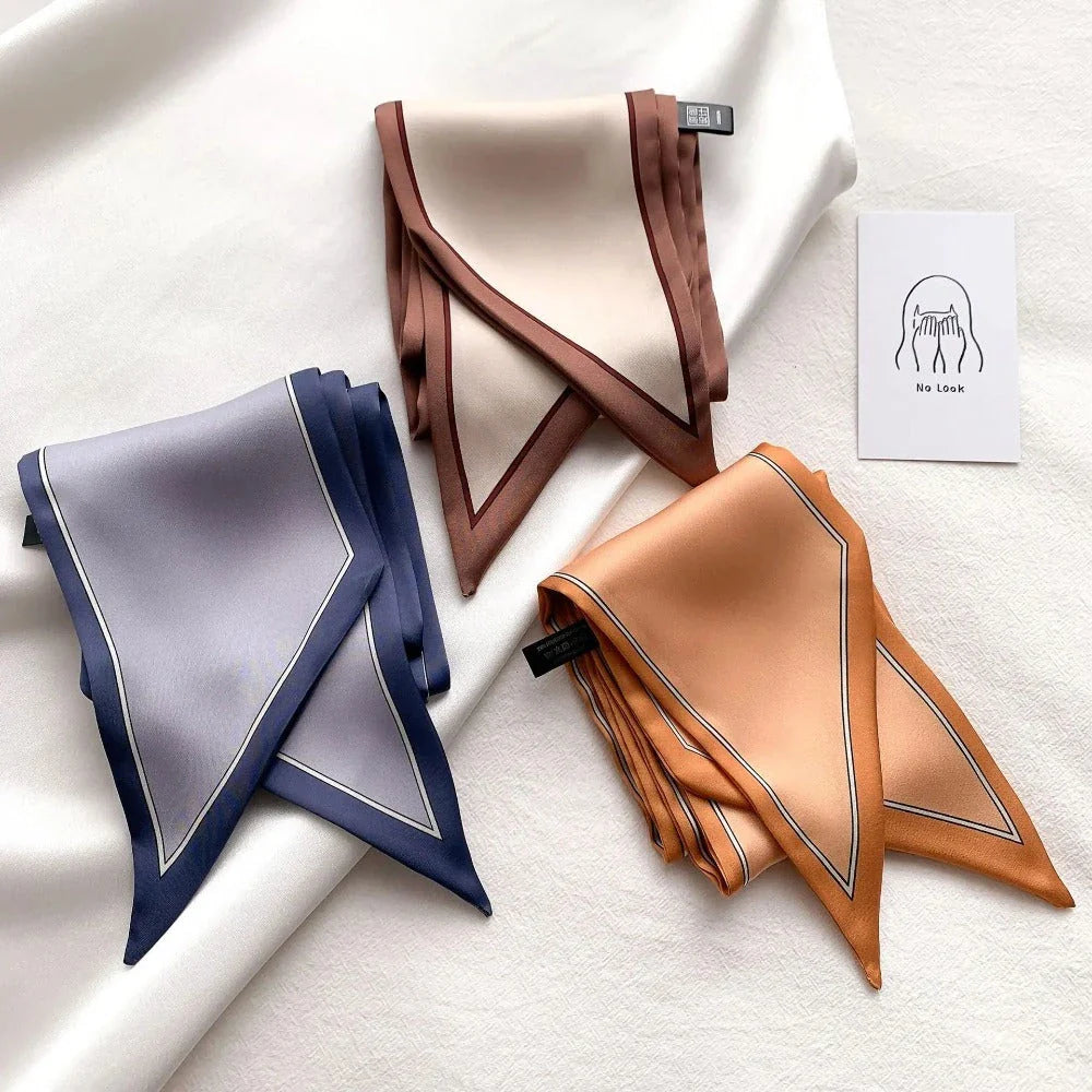 Luxury silk-feel narrow scarf in blue colour, a versatile fashion accessory for the modern British woman