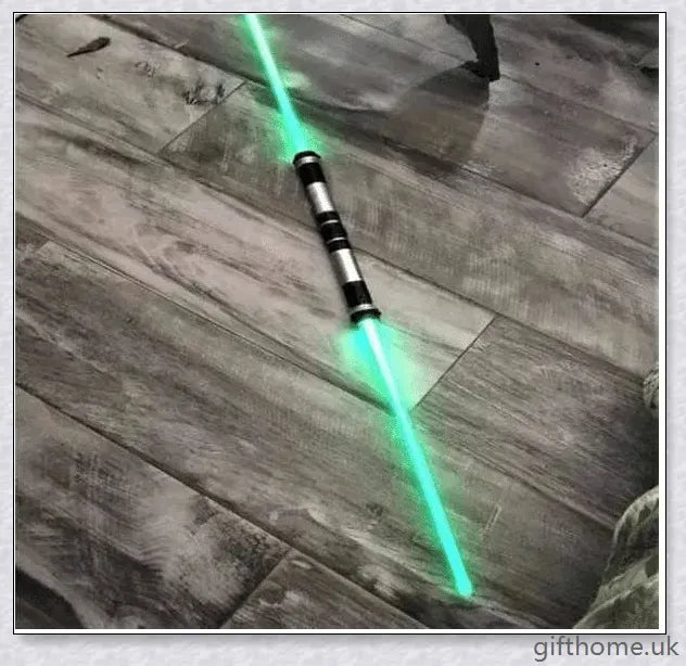 Premium dual-bladed lightsaber with sleek silver hilt, vibrant light modes, and sound effects for authentic Star Wars gameplay