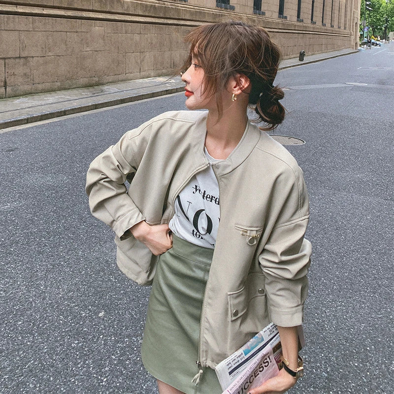 Stylish retro British autumn coat made with premium imitation leather, featuring a stand-up collar and zip-up front closure for a classic and durable look.