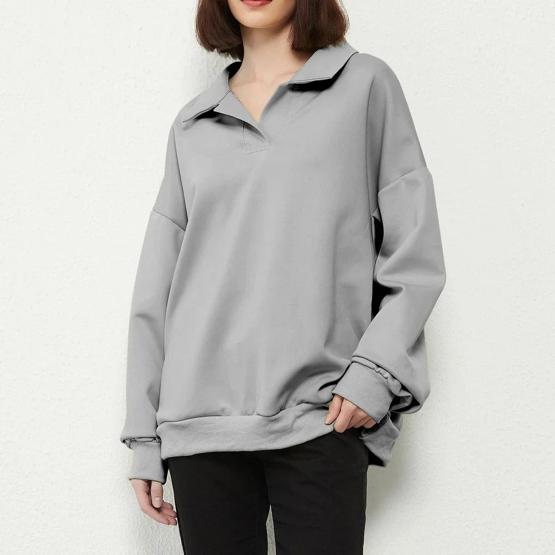 A stylish and comfortable oversize solid pullover with a turn-down collar, perfect for casual wear in the UK.