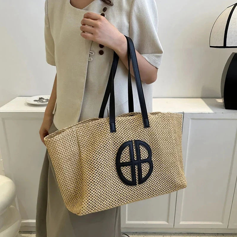 A handmade straw tote bag with a unique hollow-out knitting design, featuring a soft faux fur lining and a spacious interior for versatile use.
