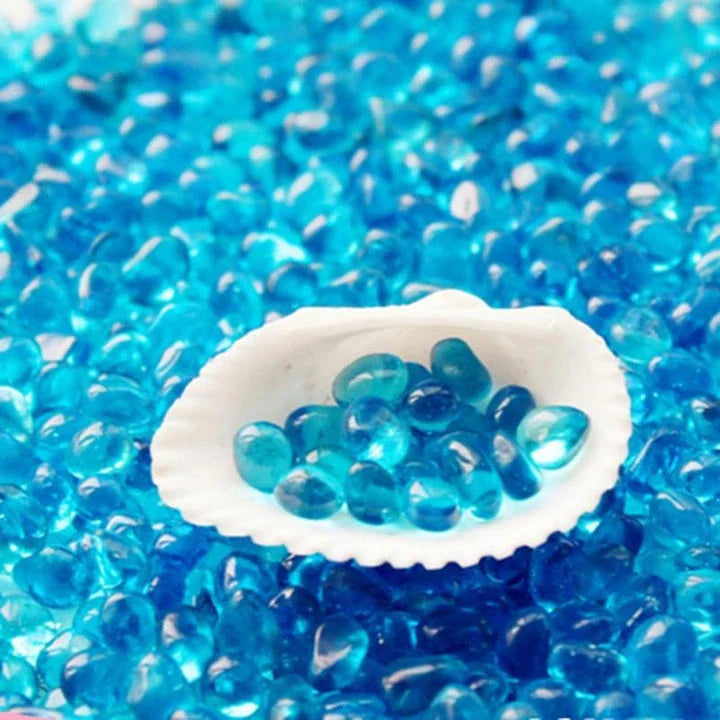 Premium blue aquarium gravel with smooth, rounded pebbles for a safe and comfortable underwater environment