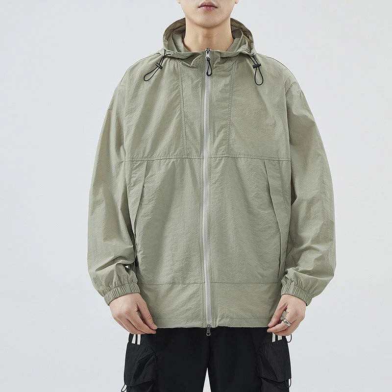 A lightweight, versatile outdoor jacket made from premium nylon fabric, perfect for British adventures and outdoor activities.
