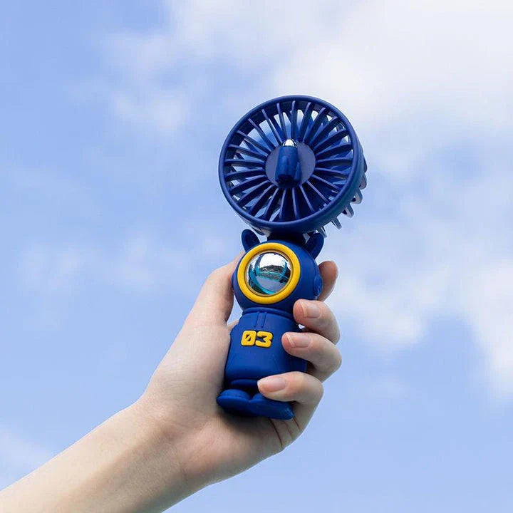 Portable Mini Hand Fan in Pink Colour, Providing Refreshing Cooling for UK Summers