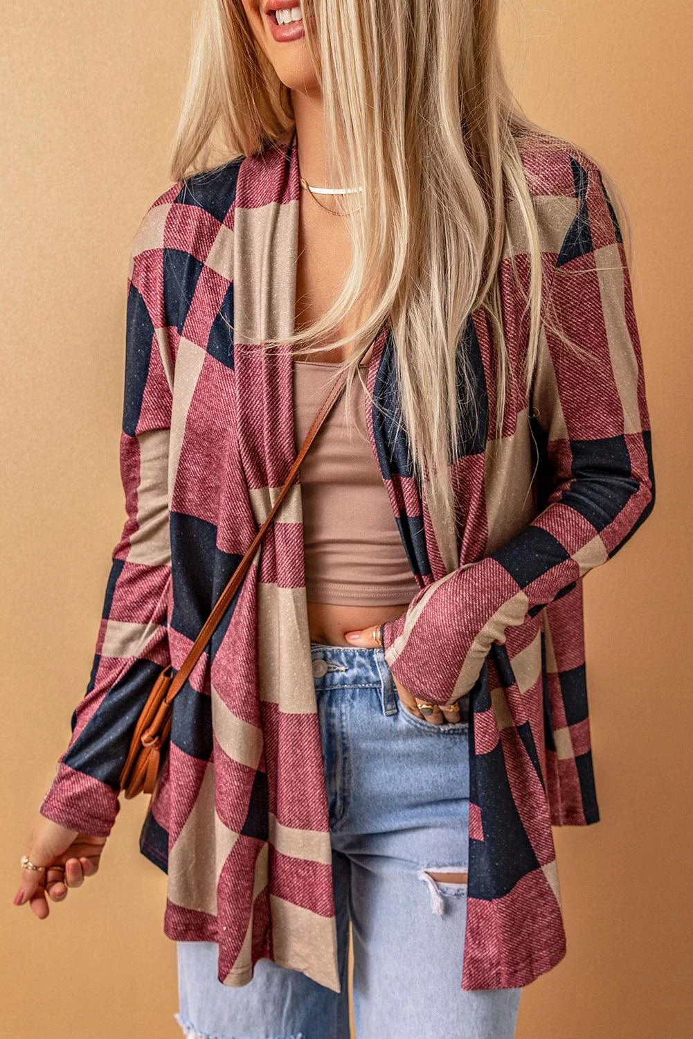 A stylish plaid open-front cardigan in a relaxed, comfortable silhouette for versatile British-inspired fashion