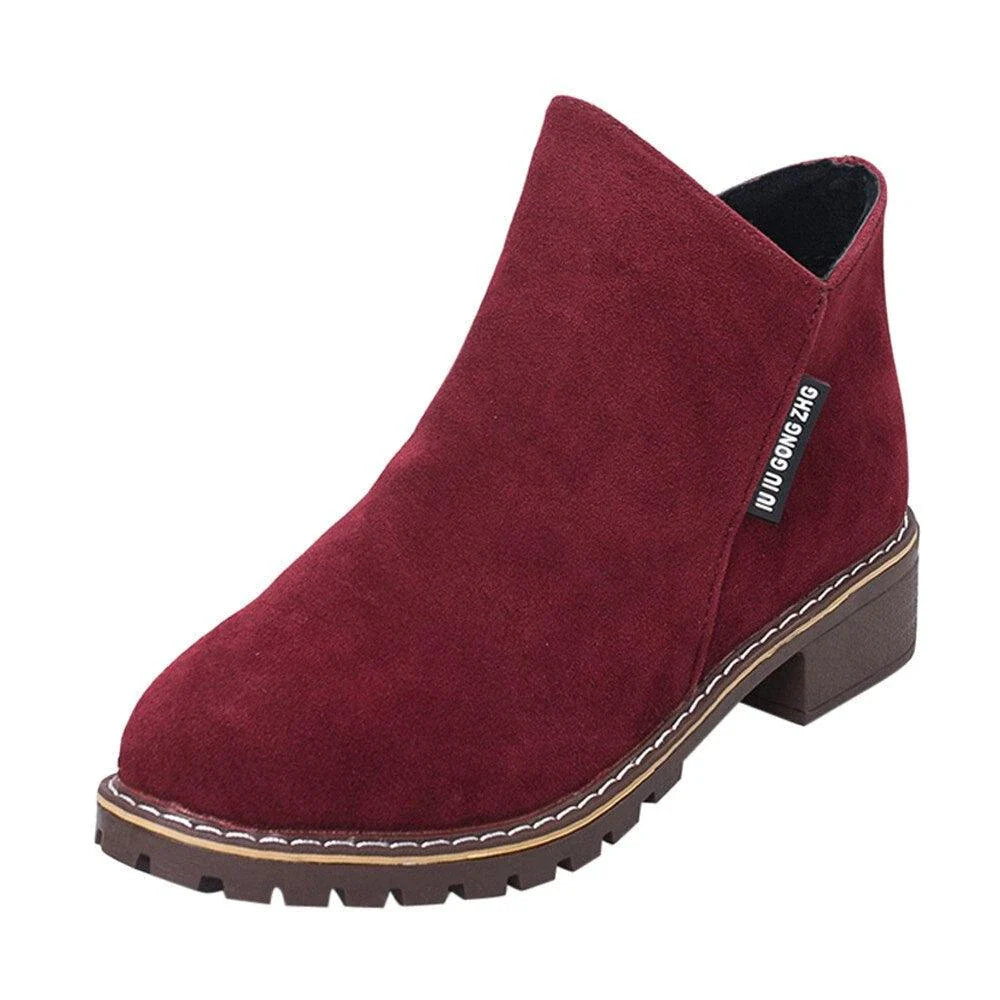 Pair of stylish low-heel frosted Martin boots in black, suitable for a variety of occasions in the UK