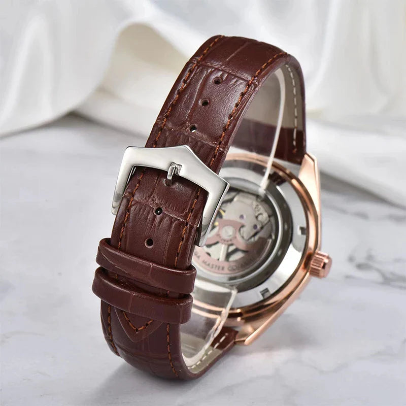 Sophisticated automatic mechanical watch with a sleek blackboard face, transparent case back, and steel strap for discerning gentlemen
