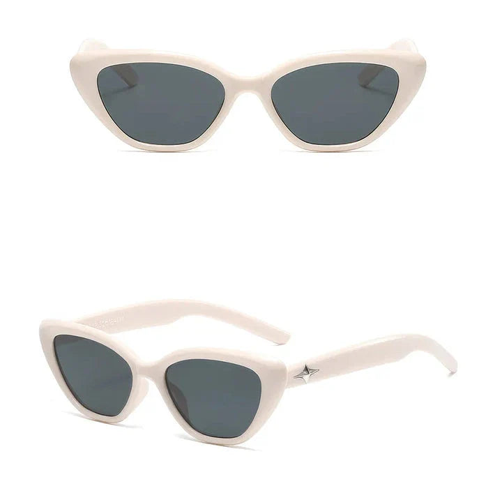 Classic cat-eye sunglasses with rice nail detail, offering UV protection and gradient lenses for a timeless, sophisticated look.