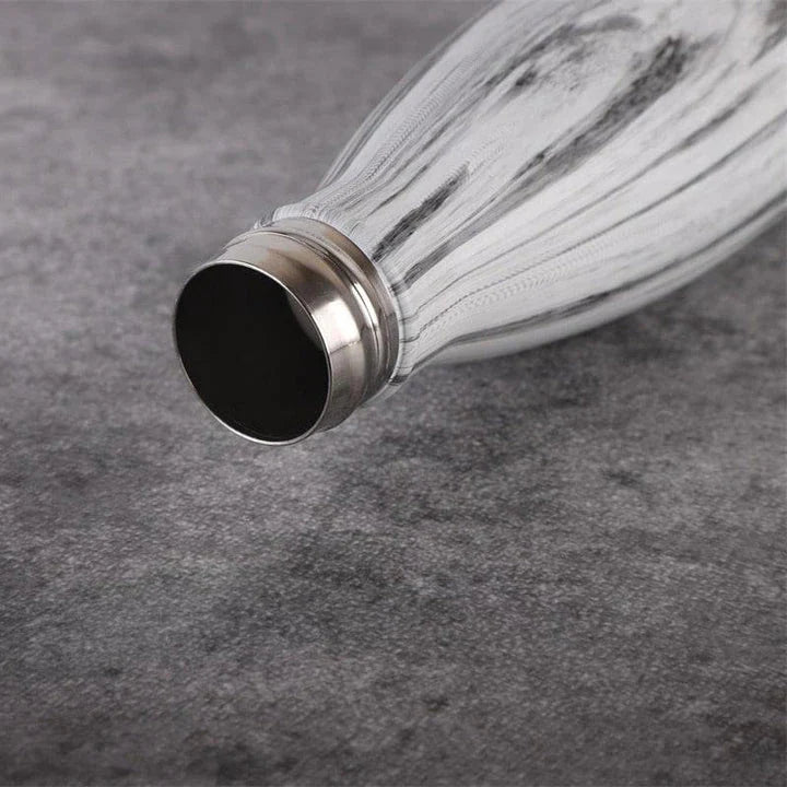 Premium stainless steel water bottle with double-walled vacuum insulation, available in pink colour and 500ml capacity