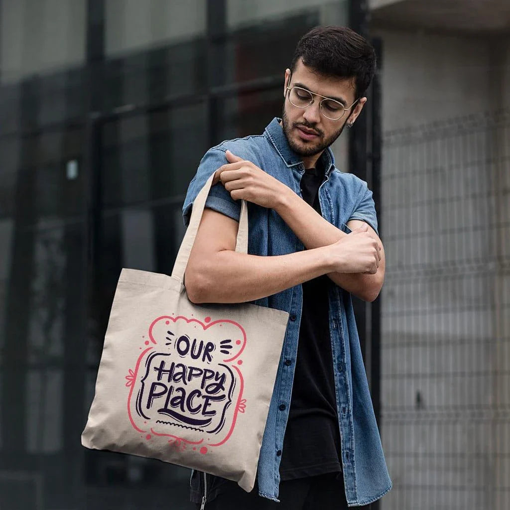 Charming small tote bag in black with stylish cotton handles, perfect for everyday use and carrying essential items.
