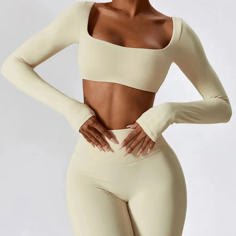 Stylish long sleeve crop top yoga shirt in green, designed for comfort and performance during workouts
