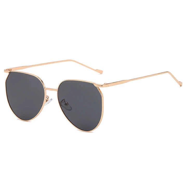 Elegant oval-shaped sunglasses with gradient lenses and alloy frames, offering timeless British style and UV protection.