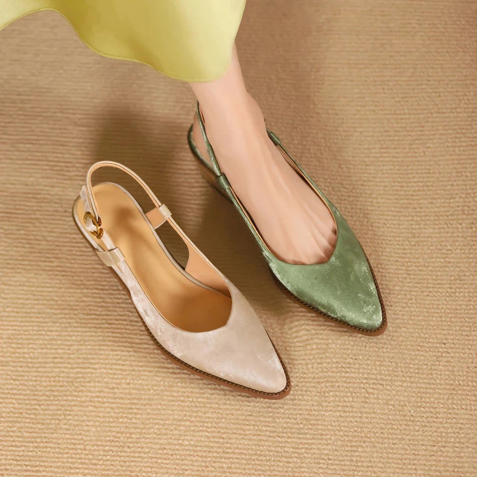 Elegant slingback leather pumps with a stylish mule design, secure buckle closure, and 4cm square heel