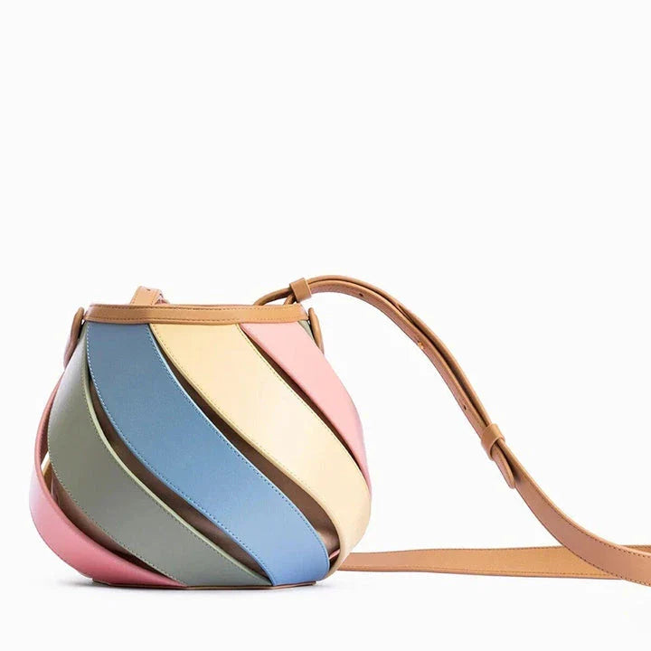 Stylish striped PU leather bucket handbag with versatile carry options and roomy interior