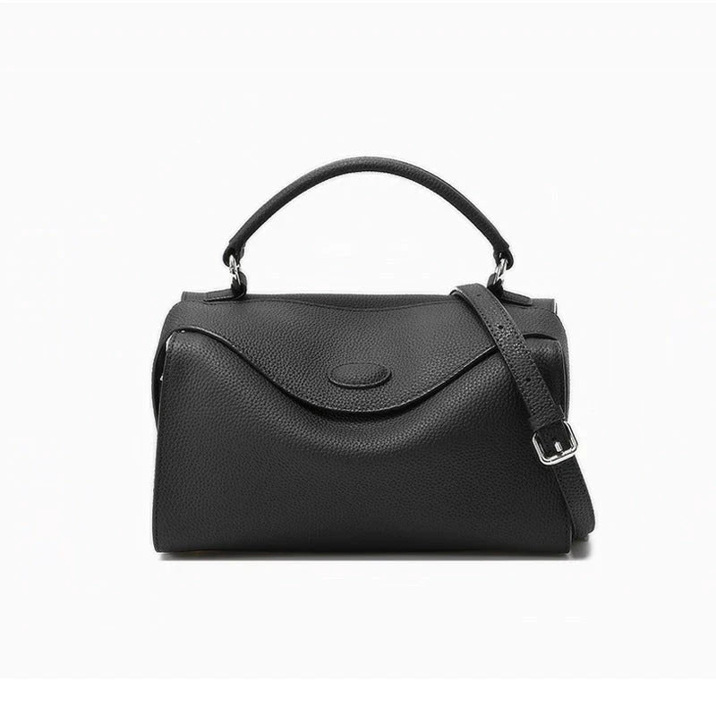Premium British cowhide leather shoulder bag with multiple interior pockets and adjustable strap for versatile wear