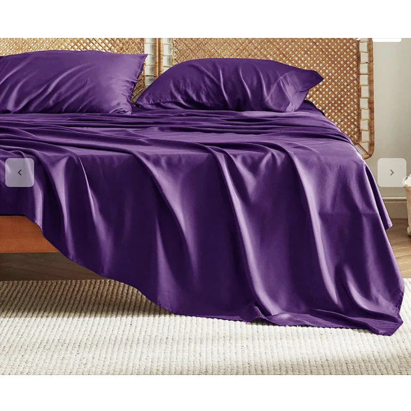Bamboo fibre bedding set with fitted sheet, pillowcases, and solid colour design
