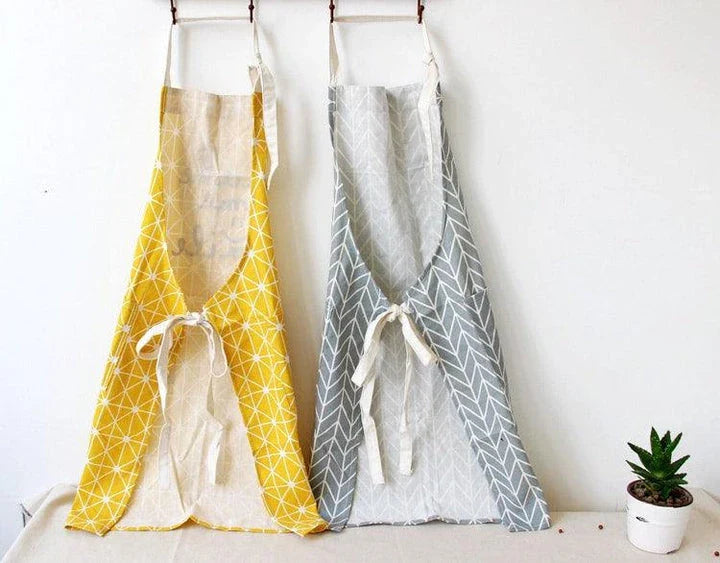 Premium cotton printed kitchen apron with floral design, offering full coverage and adjustable fit for the discerning UK homemaker