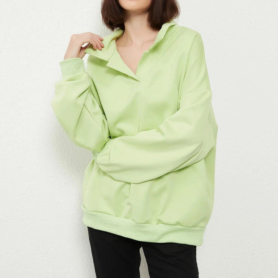 A stylish and comfortable oversize solid pullover with a turn-down collar, perfect for casual wear in the UK.
