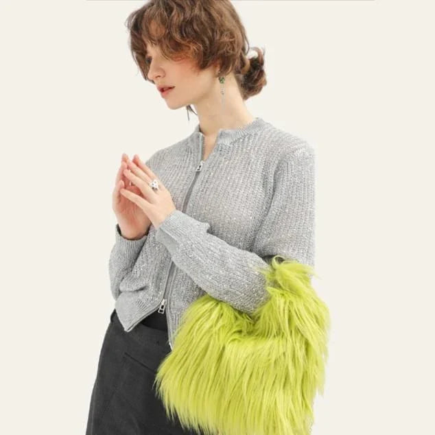 Soft, plush lime-coloured faux fur bucket bag with adjustable strap and chic chain decoration