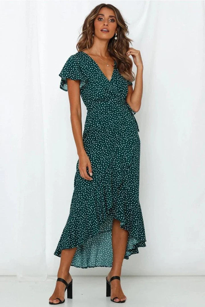 Elegant V-neck short-sleeved lace dress in a flattering silhouette, featuring delicate lace details and a blend of European and British fashion influences.
