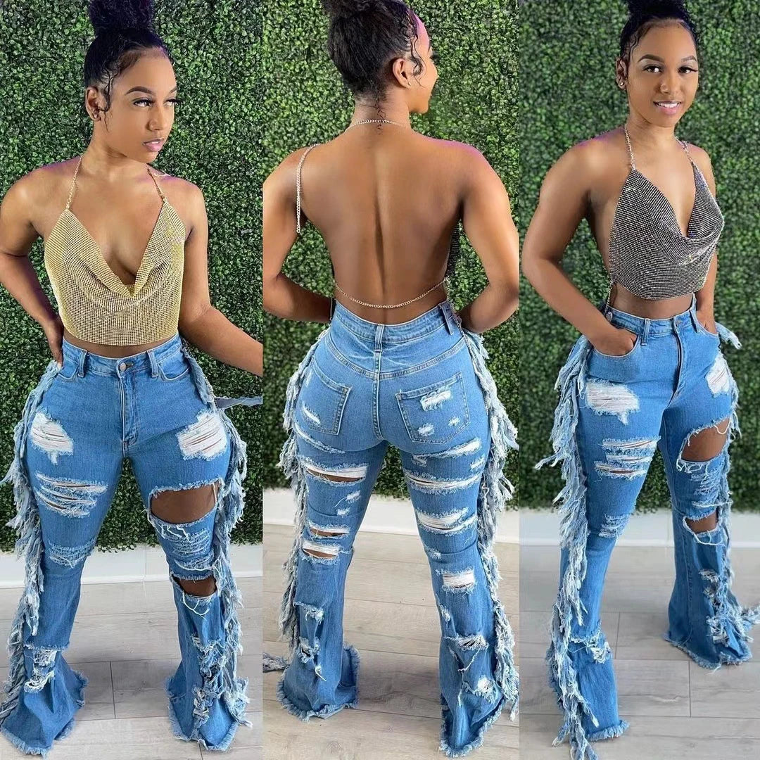 Stylishly distressed tassel jeans with light blue wash and straight-leg silhouette