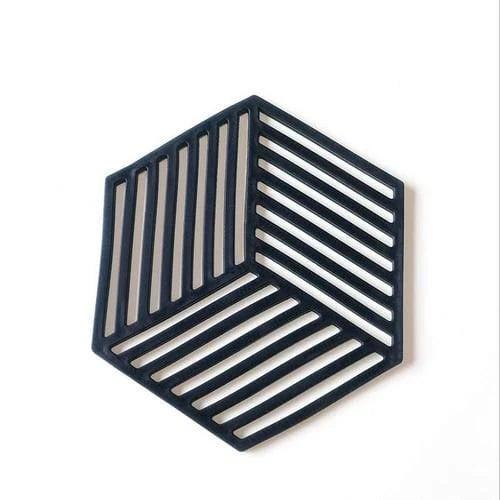 Geometric pattern cup coasters in a minimalist British design, made from durable rubber to protect surfaces