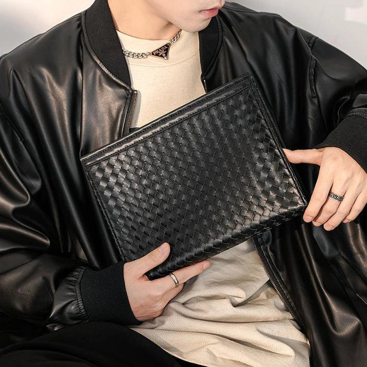 Premium hand-woven black leather briefcase with multiple pockets and adjustable shoulder strap