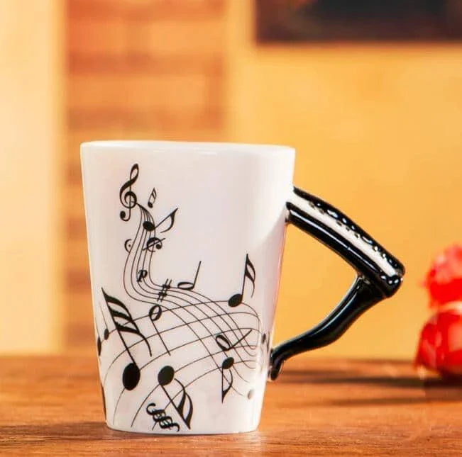 Premium eco-friendly ceramic mug with unique musical instrument-themed designs, a charming and sustainable addition to any kitchen.